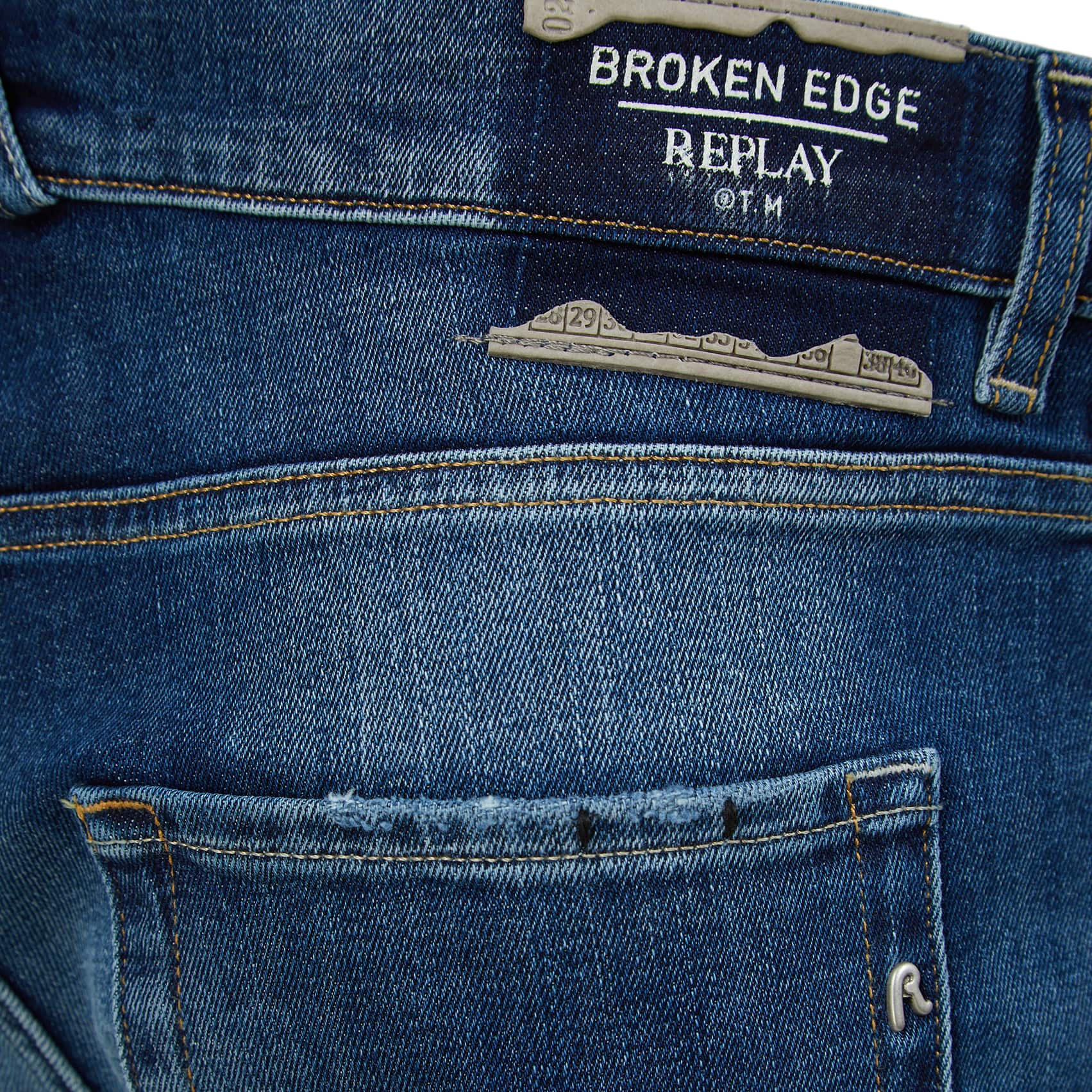 REPLAY MICKYM BROKEN EDGE TAPERED FIT JEANS